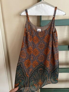 CAbi XS sleeveless top for jeans or office or going out